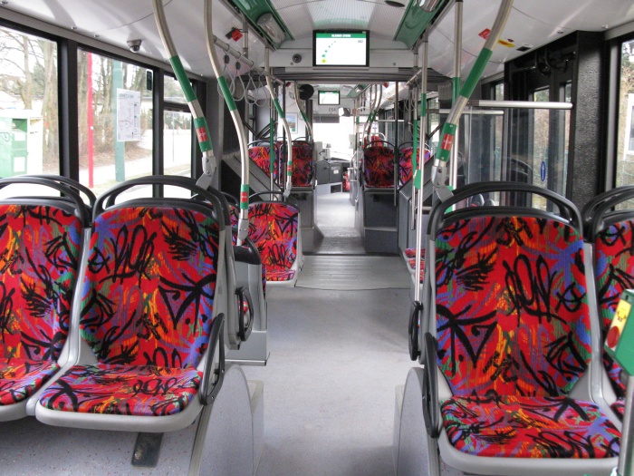 Articulated trolleybus no. 054 of the Polish type Solaris Trollino 18 III Cegelec AC - back interior view